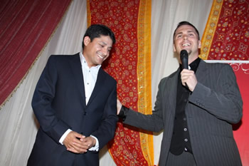 Aaron and audience member share a laugh.