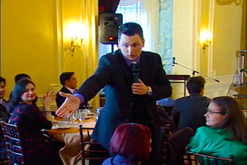 Aaron picks a volunteer from the audience.