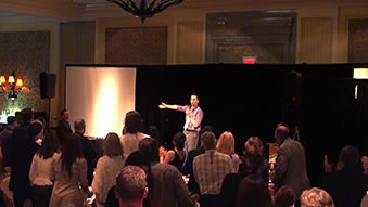 Corporate Entertainer Aaron Paterson performs for OACC and receives a standing ovation.