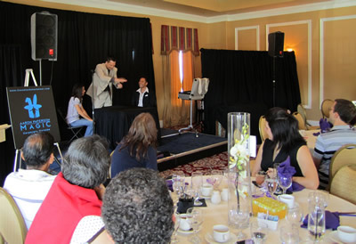 Toronto illusionist, Aaron Paterson performing at an RSA Group corporate luncheon