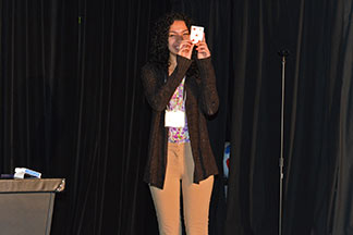 A lady from the audience is amazed that Aaron was able to read her mind.