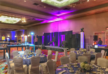 Corporate party ideas Toronto - Photo of a table set in a banquet facility with wonderful atmosphere.