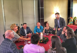 Aaron Paterson was recently the magician for an exlcusive members event at the Georgian Bay golf club in Clarksburg Ontario. In this photos guests react to an amazing magic trick that Aaron Paterson performs.