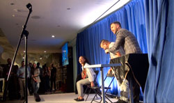Aaron Paterson makes staff laugh while performing corporate entertainment for Kinross Gold's 30th Anniversary.