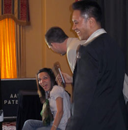 Toronto Illusionist, Aaron on stage with two audience volunteers