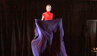 Aaron Paterson's assistant Elise magicial appears while performing for Revlon in Ontario.