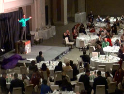 corporate entertainers Toronto take bow before a large audience.