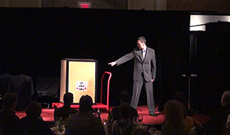 Corporate Entertainer Aaron Paterson performs his origianl illusion for OACC