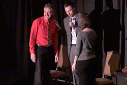 Stage volunteers laugh hysterically at Aaron Paterson's corporate entertainment at the Ajax Convention centre in Ontario.